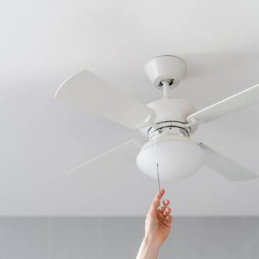 How Does a Ceiling Fan Assist My AC System?