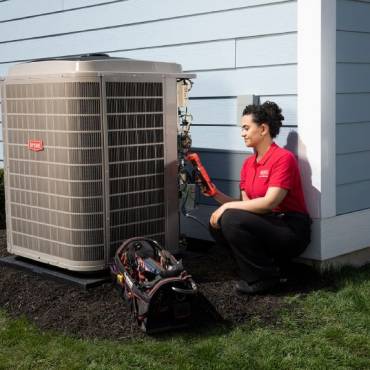 How often should I service my air conditioner